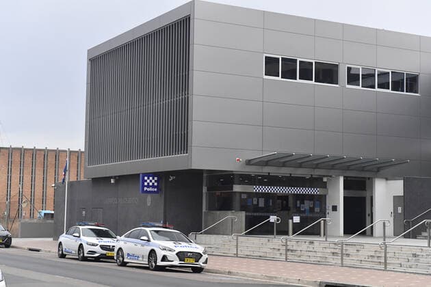 NSW POLICE COVID19 COMPLIANCE, Police cars are seen outside the Liverpool Police Station in the southwestern suburb of Liverpool in Sydney, Friday, July 9, 2021. At least 100 more police will be deployed to southwest Sydney from Friday in a high-visibility operation to ensure compliance with public health orders. ( NO ARCHIVING, EDITORIAL USE ONLY, NO USE IN BOOKS WITHOUT CONSENT SYDNEY NSW AUSTRALIA  Copyright: xMICKxTSIKASx 20210709001555910190
