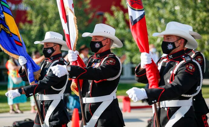 July 9, 2021, Calgary, ab, Canada: Members of the Calgary Fire Department march during the Calgary Stampede parade in Calgary, Alta., Friday, July 9, 2021. Calgary Canada  - ZUMAc35_ 20210709_zaf_c35_015 Copyright: xJeffxMcintoshx