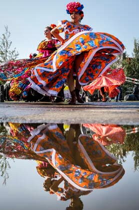 July 9, 2021, Calgary, ab, Canada: Dancers from the Mexican community dance during the Calgary Stampede parade in Calgary, Alta., Friday, July 9, 2021. Calgary Canada  - ZUMAc35_ 20210709_zaf_c35_016 Copyright: xJeffxMcintoshx