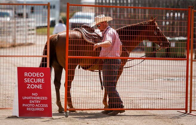 July 9, 2021, Calgary, ab, Canada: A cowboy and his horse enter the rodeo secure zone at the Calgary Stampede in Calgary, Alta., Friday, July 9, 2021. Calgary Canada  - ZUMAc35_ 20210709_zaf_c35_026 Copyright: xJeffxMcintoshx