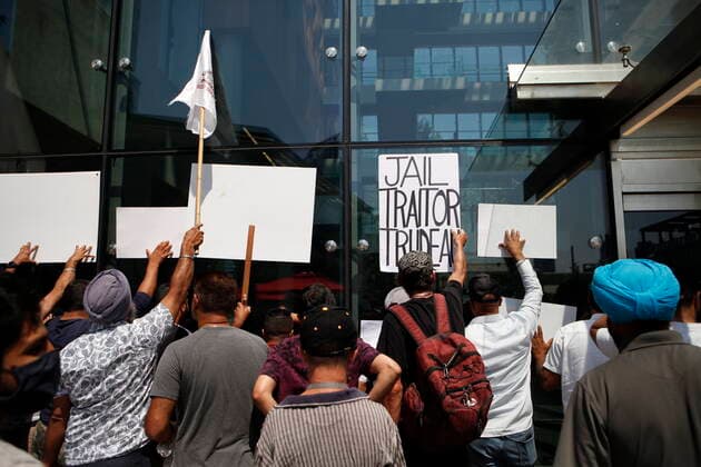 July 9, 2021, Surrey, BC, Canada: People protest in the courtyard following an announcement about transit by Prime Minister Justin Trudeau during a press conference at Surrey City Hall in Surrey, B.C., on Friday, July 9, 2021. Surrey Canada  - ZUMAc35_ 20210709_zaf_c35_062 Copyright: xChadxHipolitox