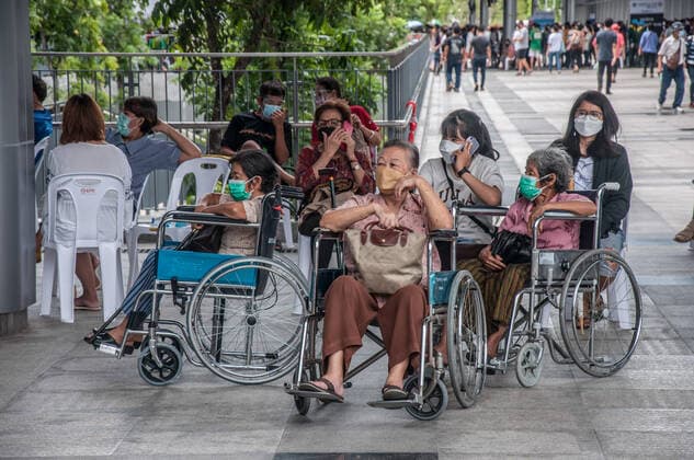 July 11, 2021, Bangkok, Thailand: Elderly people wait in wheel chairs to be vaccinated with AstraZeneca vaccine outside Bang Sue Grand Station during a vaccination against COVID-19 at Bang Sue Grand Station in Bangkok. .Thailand has a record high of 86 new Covid-19 fatalities and 9,539 new cases over the past 24 hours, the Public Health Ministry reported. Bangkok Thailand - ZUMAs197 20210711_zaa_s197_076 Copyright: xPeeraponxBoonyakiatx