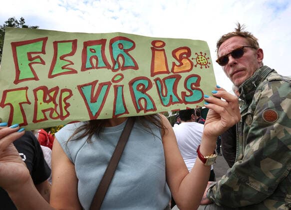 July 11, 2021, London, United Kingdom: Laurence Fox holds a placard expressing her opinion outside Centre Court during the demonstration..Demonstrators protest outside Wimbledon tennis tournament on Men s Finals Day as they call for freedom of choice, medical freedom with no Covid checks necessary to gain access to major sporting events and no vaccine passports. London United Kingdom - ZUMAs197 20210711_zaa_s197_130 Copyright: xMartinxPopex