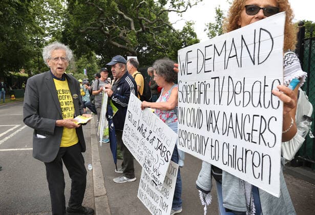 July 11, 2021, London, United Kingdom: Piers Corbyn joins protesters as they hold up placards expressing their opinions outside Centre Court during the demonstration..Demonstrators protest outside Wimbledon tennis tournament on Men s Finals Day as they call for freedom of choice, medical freedom with no Covid checks necessary to gain access to major sporting events and no vaccine passports. London United Kingdom - ZUMAs197 20210711_zaa_s197_131 Copyright: xMartinxPopex