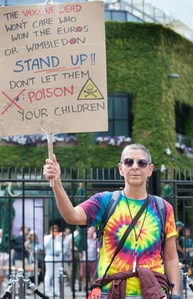 July 11, 2021, London, United Kingdom: A protester holds a placard expressing his opinion outside Centre Court during the demonstration..Demonstrators protest outside Wimbledon tennis tournament on Men s Finals Day as they call for freedom of choice, medical freedom with no Covid checks necessary to gain access to major sporting events and no vaccine passports. London United Kingdom - ZUMAs197 20210711_zaa_s197_147 Copyright: xMartinxPopex