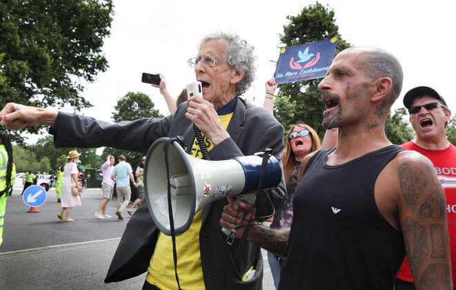 July 11, 2021, London, United Kingdom: Piers Corbyn speaks through a megaphone outside Centre Court during the demonstration..Demonstrators protest outside Wimbledon tennis tournament on Men s Finals Day as they call for freedom of choice, medical freedom with no Covid checks necessary to gain access to major sporting events and no vaccine passports. London United Kingdom - ZUMAs197 20210711_zaa_s197_150 Copyright: xMartinxPopex