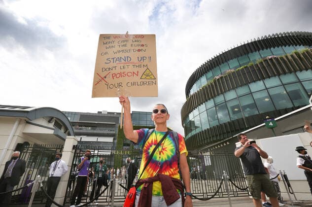 July 11, 2021, London, United Kingdom: A protester holds a placard expressing his opinion outside Centre Court during the demonstration..Demonstrators protest outside Wimbledon tennis tournament on Men s Finals Day as they call for freedom of choice, medical freedom with no Covid checks necessary to gain access to major sporting events and no vaccine passports. London United Kingdom - ZUMAs197 20210711_zaa_s197_152 Copyright: xMartinxPopex