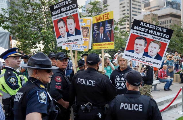 July 12, 2021, Calgary, ab, Canada: Protesters shout slogans as Alberta Premier Jason Kenney hosts the Premier s annual Stampede breakfast in Calgary, Alta., Monday, July 12, 2021. Calgary Canada  - ZUMAc35_ 20210712_zaf_c35_017 Copyright: xJeffxMcintoshx