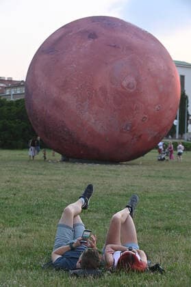 A giant inflatable model of the planet Mars is exhibited by the Brno Observatory and Planetarium on the Cow Mountain in Brno, Czech Republic, on July 12, 2021. (CTKxPhoto IgorxZehl) CTKPhotoP2021071209417  zeh