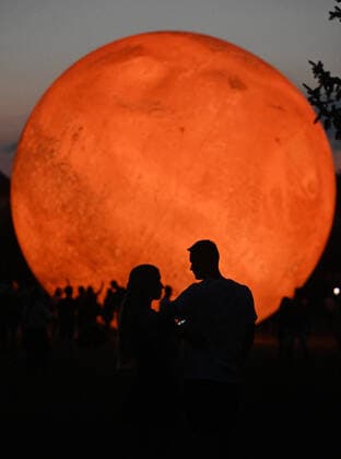 A giant inflatable model of the planet Mars is exhibited by the Brno Observatory and Planetarium on the Cow Mountain in Brno, Czech Republic, on July 12, 2021. (CTKxPhoto IgorxZehl) CTKPhotoP2021071209625  zeh