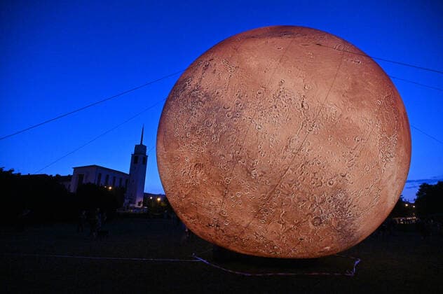 A giant inflatable model of the planet Mars is exhibited by the Brno Observatory and Planetarium on the Cow Mountain in Brno, Czech Republic, on July 12, 2021. (CTKxPhoto IgorxZehl) CTKPhotoP2021071209627  zeh