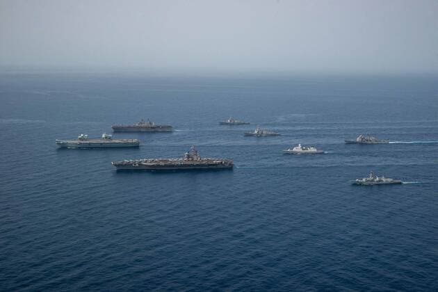 GULF OF ADEN (July 12, 2021) Ships of the UK Carrier Strike Group, USS Ronald Reagan Carrier Strike Group, and Iwo Jima Amphibious Ready Group operate in formation in the Gulf of Aden, July 12. UK, Dutch and U.S. naval forces conducted an integrated at-sea exercise designed to enhance maritime interoperability and demonstrate naval integration through a series of training scenarios. ( ) Where: Gulf of Aden When: 12 Jul 2021 Credit: US Navy Cover-Images.com **Editorial Use Only** Copyright: xx 41582258 EDITORIAL USE ONLY. NOT FOR USE BY NEWSPAPERS BASED IN THE UK.