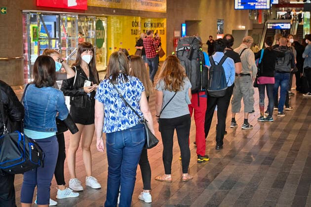 People queue to be jabbed here and now in front of the vaccination center against covid-19 in Prague Main Railway Station, Czech Republic, on Wednesday, July 14, 2021. Further such vaccination centres are to open at railway stations in Czechia, mainly in regional capitals and important transport hubs. (CTKxPhoto VitxSimanek) CTKPhotoP2021071403443  VIS 002