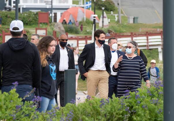 July 14, 2021, PERCE, PQ, Canada: Prime Minister Justin Trudeau and Minister of National Revenue Diane Lebouthillier take a stroll on the boardwalk near the Perce rock, following a meeting on Wednesday, July 14, 2021 in Perce, Quebec. PERCE Canada  - ZUMAc35_ 20210714_zaf_c35_003 Copyright: xJacquesxBoissinotx