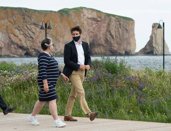 July 14, 2021, PERCE, PQ, Canada: Prime Minister Justin Trudeau and Minister of National Revenue Diane Lebouthillier take a stroll on the boardwalk near the Perce rock, following a meeting on Wednesday, July 14, 2021 in Perce, Quebec. PERCE Canada  - ZUMAc35_ 20210714_zaf_c35_005 Copyright: xJacquesxBoissinotx
