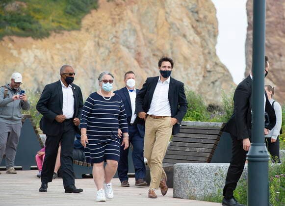 July 14, 2021, PERCE, PQ, Canada: Prime Minister Justin Trudeau and Minister of National Revenue Diane Lebouthillier take a stroll on the boardwalk near the Perce rock, following a meeting on Wednesday, July 14, 2021 in Perce, Quebec. PERCE Canada  - ZUMAc35_ 20210714_zaf_c35_006 Copyright: xJacquesxBoissinotx