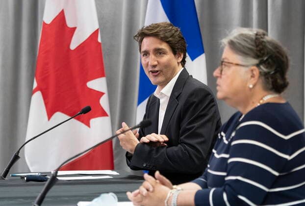 July 14, 2021, PERCE, PQ, Canada: Prime Minister Justin Trudeau, left, and Minister of National Revenue Diane Lebouthillier participate in a virtual roundtable discussion with community stakeholders from the oÅ½les-de-la-Madeleine, Wednesday, July 14, 2021 in Perce, Quebec. PERCE Canada  - ZUMAc35_ 20210714_zaf_c35_008 Copyright: xJacquesxBoissinotx
