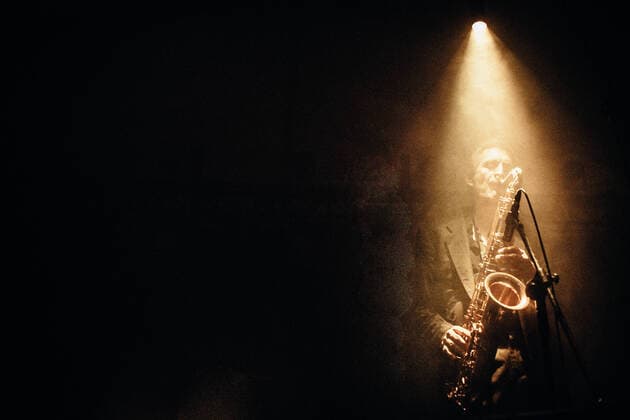 Bohren & der Club of Gore Musician and saxophonist Christoph Cl?ser from the German jazz band Bohren & der Club of Gore pictured in a light beam at a concert at Off Festival in Poland. 2013. Katowice Poland  Copyright: xGonzalesxPhoto MalthexIvarssonx