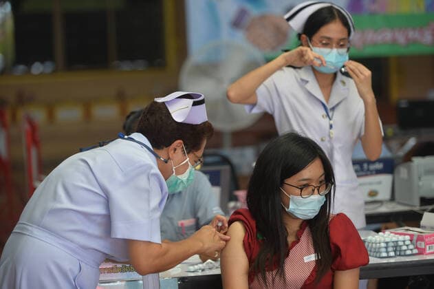 (210715) -- BANGKOK, July 15, 2021 -- A citizen receives a dose of COVID-19 vaccine in Bangkok, Thailand, July 15, 2021. Thailand plans to set a limit on its exports of locally-manufactured AstraZeneca COVID-19 vaccines to meet domestic demand as the country is struggling to contain a months-long surge in infections, a senior official said Wednesday. ) THAILAND-BANGKOK-COVID-19-VACCINATION RachenxSageamsak 