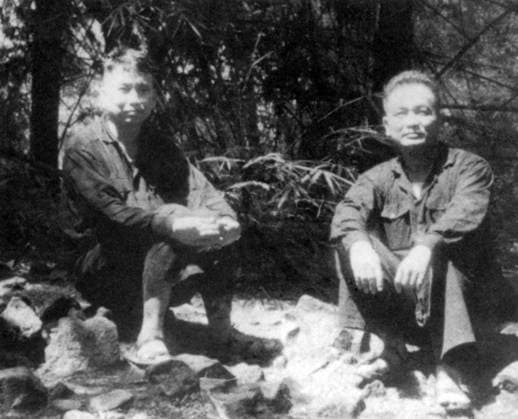 The future Khmer Rouge top leadership Pol Pot (Brother No. 1) and Nuon Chea (Brother No. 2) in the jungle, probably on the Vietnamese-Cambodian frontier in Ratanakiri Province.<br ><br > The Khmer Rouge, or Communist Party of Kampuchea, ruled Cambodia from 1975 to 1979, led by Pol Pot, Nuon Chea, Ieng Sary, Son Sen and Khieu Samphan. It is remembered primarily for its brutality and policy of social engineering which resulted in millions of deaths. Its attempts at agricultural reform led to widespread famine, while its insistence on absolute self-sufficiency, even in the supply of medicine, led to the deaths of thousands from treatable diseases (such as malaria). Brutal and arbitrary executions and torture carried out by its cadres against xSupplier:xCPAxMediaxCo.xLtd.x Copyright: xx