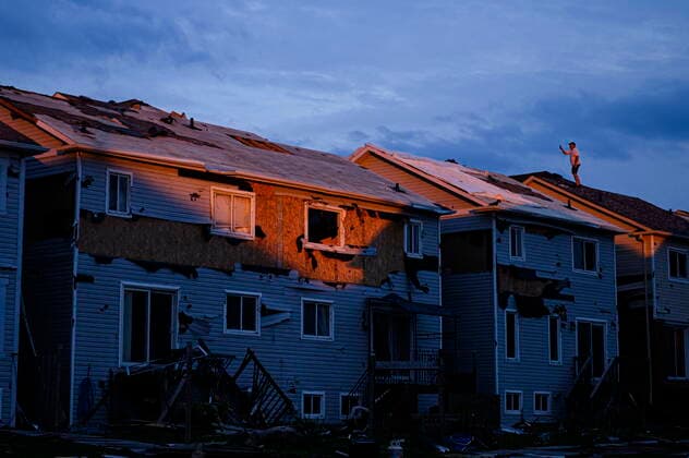 July 15, 2021, Barrie, on, Canada: A man surveys the damage left after a tornado touched down in his neighbourhood, in Barrie, Ont., on Thursday, July 15, 2021. Barrie Canada  - ZUMAc35_ 20210715_zaf_c35_094 Copyright: xChristopherxKatsarovx