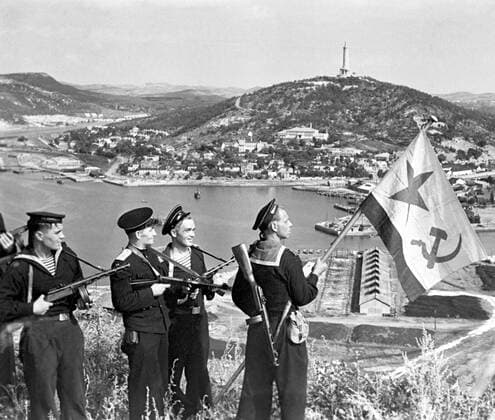 The Manchurian Strategic Offensive Operation began on 9 August 1945 with the Soviet invasion of the Japanese puppet state of Manchukuo. It was the last campaign of the Second World War, and the largest of the 1945 Soviet Japanese War which resumed hostilities between the Soviet Union and the Empire of Japan after almost six years of peace.<br ><br > Temporary Soviet gains on the continent were Manchukuo, Inner Mongolia and northern Korea. The Soviet entry into the war and the defeat of the Kwantung Army was a significant factor in the Japanese government s decision to surrender. China USSR: Pacific Fleet marines of the Soviet Navy hoisting the Soviet naval ensign in Dalian (Port Arthur), on October 1, 1945. Photo by Haldei RIA Novosti xSupplier:xCPAxMediaxCo.xLtd.x Copyright: xHaldei RIAxNovostix(CCxBY-SAx3.0x