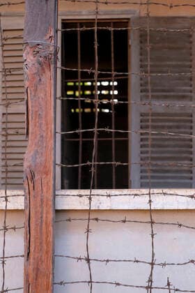 The Tuol Sleng Genocide Museum is a museum in Phnom Penh, the capital of Cambodia. The site is a former high school which was used as the notorious Security Prison 21 (S-21) by the Khmer Rouge communist regime from its rise to power in 1975 to its fall in 1979. Tuol Sleng means Hill of the Poisonous Trees or Strychnine Hill .<br ><br > The Khmer Rouge, or Communist Party of Kampuchea, ruled Cambodia from 1975 to 1979, led by Pol Pot, Nuon Chea, Ieng Sary, Son Sen and Khieu Samphan. It is remembered primarily for its brutality and policy of social engineering which resulted in millions of deaths. Its attempts at agricultural reform led to widespread famine, while its insistence on absolute self-sufficiency, even in the supply of medicine xCPAxMediaxCo.xLtd.x Copyright: xOliverxHargreavex