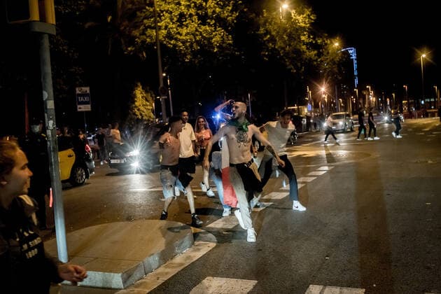 July 17, 2021, Barcelona, Spain: Revelers take to the streets after been removed form the beach of La Barceloneta during the first day of nightly curfew reimposed in Barcelona and almost all Catalan territory to try to stop the spread of Coronavirus Delta variant. Barcelona Spain - ZUMAb137 20210717_zap_b137_008 Copyright: xJordixBoixareux