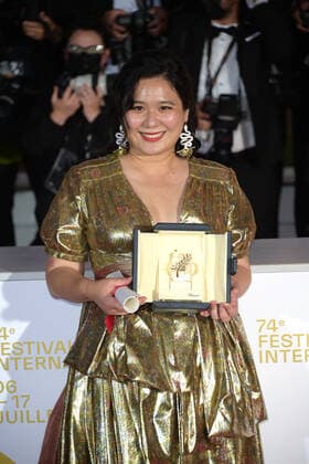 74th Cannes Film Festival, Photocall Palme D Or Winner. Pictured Tang Yi poses with the Best Short Movie Award  Copyright: xSimonexComix xIPAx xCannesxpoolx