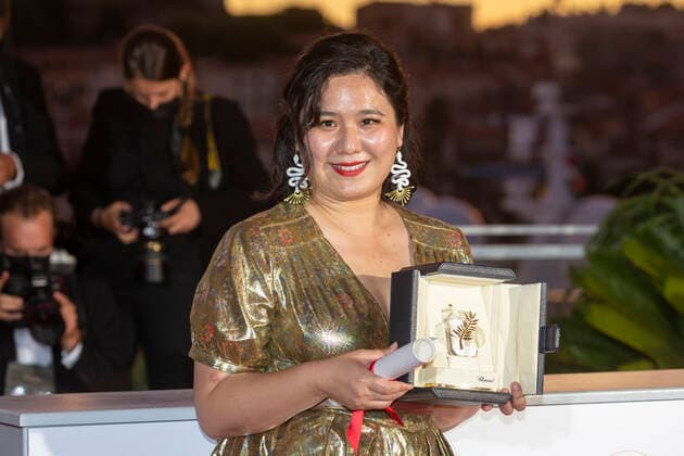 July 17, 2021, Tang Yi poses with the Best Short Movie Award for Tous les corbeaux du monde during the 74th Annual Cannes Film Festival at Palais des Festivals in Cannes, France, on 17 July 2021. Photo: - ZUMAm179 20210717_zep_m179_132 Copyright: xAlecxMichaelx