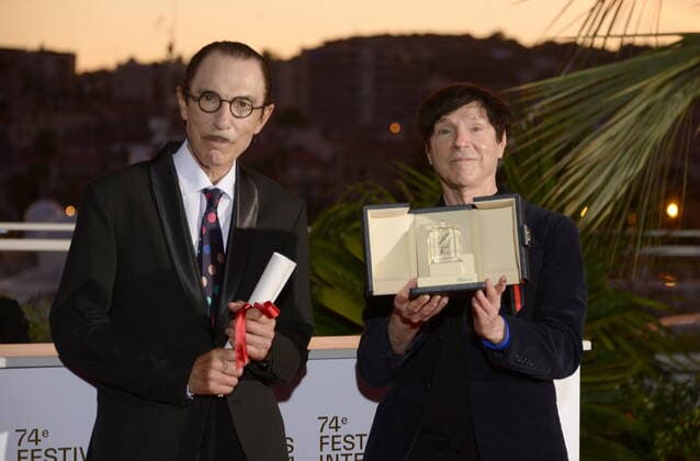 July 17, 2021, CANNES, France: CANNES, FRANCE - JULY 17: Ron Mael and Russell Mael pose with the Best Director Award in the name of Leos Carax for Annette during the 74th annual Cannes Film Festival on July 17, 2021 in Cannes, France CANNES France - ZUMAi09_ 20210717_zaf_i09_044 Copyright: xFrederickxInjimbertx
