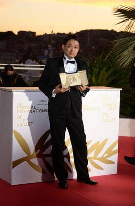 July 17, 2021, CANNES, France: CANNES, FRANCE - JULY 17: Ryusuke Hamaguchi poses with the Best Screenplay Award for Drive my Car during the 74th annual Cannes Film Festival on July 17, 2021 in Cannes, France CANNES France - ZUMAi09_ 20210717_zaf_i09_047 Copyright: xFrederickxInjimbertx