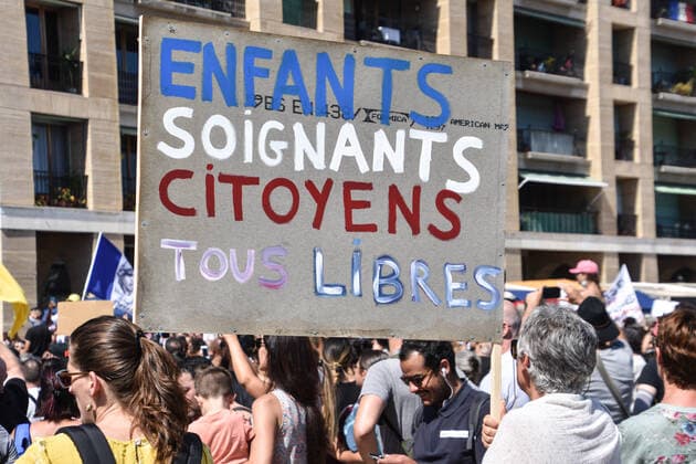 July 17, 2021, Marseille, France: A protester holds a placard during the demonstration against the health pass in Marseille..More than 4,000 people in Marseille demonstrated against a health pass that French President Emmanuel Macron announced among the new anti-Covid 19 measures which will be necessary to be frequenting cafÃ terraces, restaurants, cinemas, theatres and other culture and leisure activities to help contain the spread of the Covid-19 virus. Marseille France - ZUMAs197 20210717_zaa_s197_463 Copyright: xGerardxBottinox