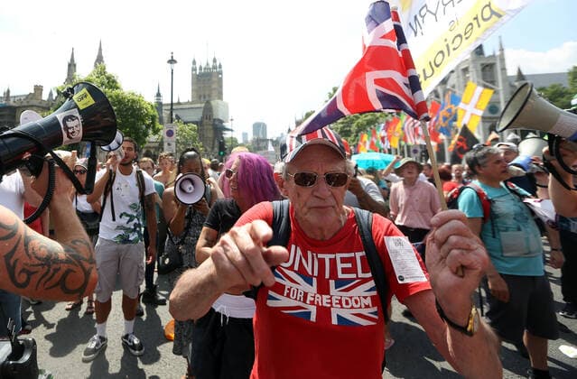 July 19, 2021, London, England, United Kingdom: Anti-lockdown and anti-vaccine protesters stage a demonstration in central London. Almost all coronavirus restrictions including social distancing and mask wearing are lifted in England from today onwards. The final stage of lockdown lifting acmes as countryÃ¢â‚¬â ¢s Health Secretary Sajid Javid tested positive for coronavirus and Prime Minister Boris Johnson and Chancellor RIshi Sunak pinged by NHS app and. Started self-isolation. London United Kingdom - ZUMAs262 20210719_zip_s262_066 Copyright: xTayfunxSalcix