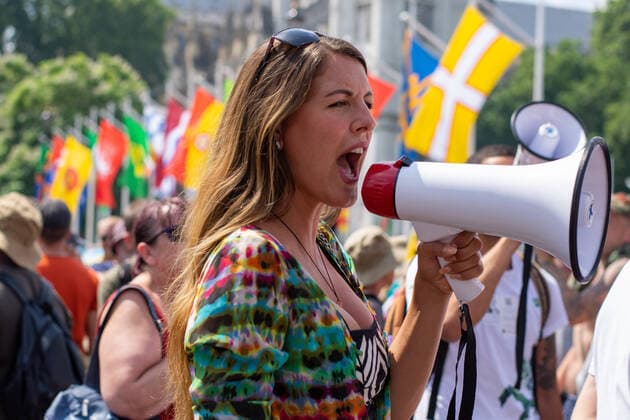 July 19, 2021, London, United Kingdom: A protester speaks through a megaphone during the demonstration..Thousands of people gathered near Parliament Square in a protest against health passports, protective masks, Covid-19 vaccines and lockdown restrictions. London United Kingdom - ZUMAs197 20210719_zaa_s197_072 Copyright: xPietroxRecchiax