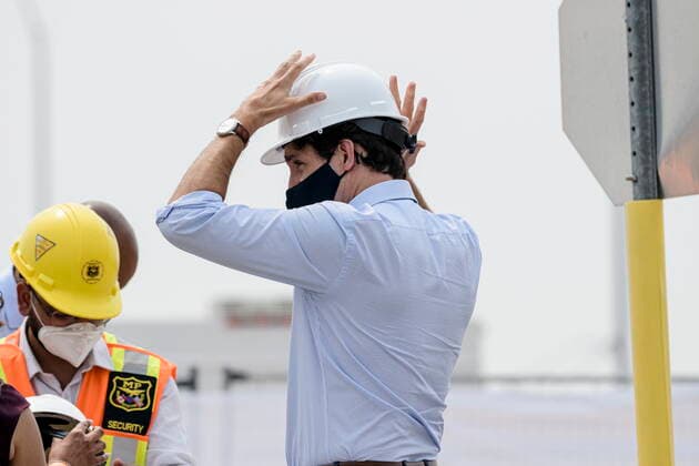 July 19, 2021, Brampton, on, Canada: Prime Minister Justin Trudeau puts on a hard hat before a tour of a construction site, in Brampton, Ont., on Monday, July 19, 2021. Brampton Canada  - ZUMAc35_ 20210719_zaf_c35_014 Copyright: xChristopherxKatsarovx