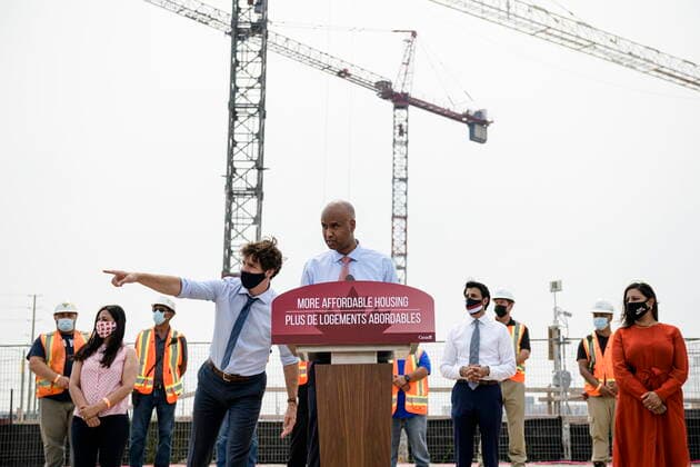 July 19, 2021, Brampton, on, Canada: Prime Minister Justin Trudeau and Minister Ahmed Hussen look on at a press conference in Brampton, Ont., on Monday, July 19, 2021. Brampton Canada  - ZUMAc35_ 20210719_zaf_c35_034 Copyright: xChristopherxKatsarovx