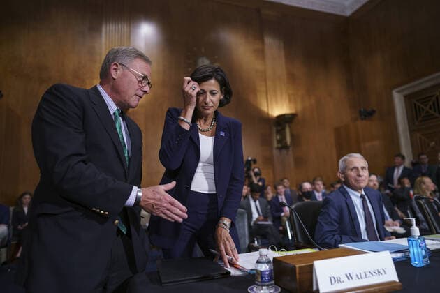 Sen. Richard Burr, R-N.C., left, speaks to Dr. Rochelle Walensky, center, director of the Centers for Disease Control and Prevention, as she and top infectious disease expert Dr. Anthony Fauci, right, arrive to testify to the Senate Health, Education, Labor, and Pensions Committee on Capitol Hill in Washington, Tuesday, July 20, 2021. The health experts are to testify about the latest in the fight against the coronavirus. Pool WAXP20210720102 J.xScottxApplewhite