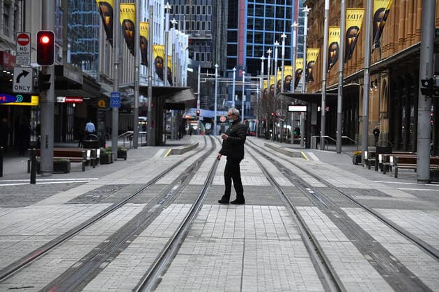 NSW CORONAVIRUS COVID19, A pedestrian walks along George St in the central business district in Sydney, Wednesday, July 21, 2021. The stay-at-home orders for coronavirus-hit Greater Sydney and surrounds have been tightened with non-essential retail to close and all construction paused until July 30. ( NO ARCHIVING, EDITORIAL USE ONLY, NO USE IN BOOKS WITHOUT CONSENT SYDNEY NSW AUSTRALIA  Copyright: xMICKxTSIKASx 20210721001558739201