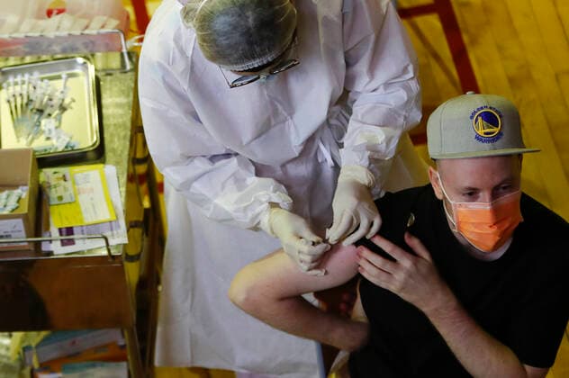 Coronavirus Vaccination In Taiwan People get inoculated with vaccines against the Coronavirus, at a site inside the National Taiwan University Hospital, as the island has seen a downward shift in the number of infections and deaths, in Taipei, Taiwan, 21 July 2021. Taiwan is discussing the possibility of easing more Covid restrictions as it supplies AstraZeneca, Moderna and Mediterranean vaccines to boost immunity rate, with travel and border restrictions remain effective. Taipei Taiwan ceng-notitle210721_npJEP  Copyright: xCengxShouxYix