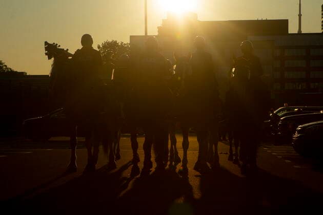 July 21, 2021, Toronto, on, Canada: Toronto police gather as they prepare to clear the Lamport Stadium Park homeless encampment in Toronto on Wednesday, July 21, 2021. Toronto Canada  - ZUMAc35_ 20210721_zaf_c35_002 Copyright: xChrisxYoungx