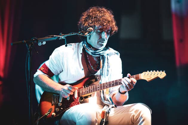 Negrita Konzert beim Flowers Festival in Collegno Italy: Negrita 2021 FLOWERS FESTIVAL, COLLEGNO, ITALY JULY 20TH: Enrico Drigo Salvi, guitarist of the italian rock band Negrita performs live on stage at for the 25th Anniversary tour. FOR EDITORIAL USE ONLY - Alessandro Bosio COLLEGNO TORINO Italy FLOWERS FESTIVAL Copyright: AlessandroxBosio