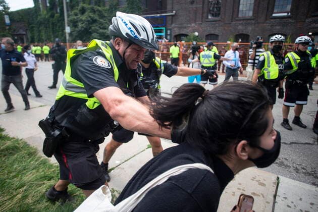 July 21, 2021, Toronto, on, Canada: Toronto police remove an encampment supporter as they clear the Lamport Stadium Park encampment in Toronto on Wednesday July 21, 2021. Toronto Canada  - ZUMAc35_ 20210721_zaf_c35_011 Copyright: xChrisxYoungx