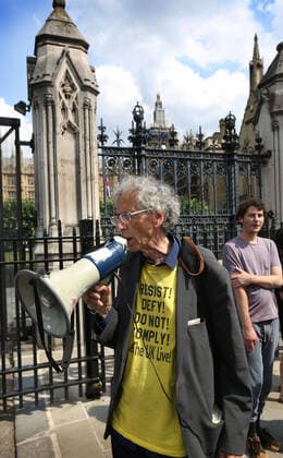 July 21, 2021, London, United Kingdom: Piers Corbyn shouts through a megaphone, during the demonstration..English weather forecaster, businessman, activist, Piers Corbyn with other protesters met outside the House of Commons at Parliament Square to protest against Vaccine passports and other Coronavirus restrictions that he feels the public are being softened up to accept as the new normal. London United Kingdom - ZUMAs197 20210721_zaa_s197_219 Copyright: xMartinxPopex