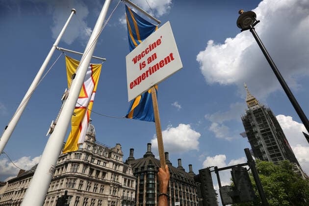 July 21, 2021, London, United Kingdom: An anti vaccination placard seen during the demonstration..English weather forecaster, businessman, activist, Piers Corbyn with other protesters met outside the House of Commons at Parliament Square to protest against Vaccine passports and other Coronavirus restrictions that he feels the public are being softened up to accept as the new normal. London United Kingdom - ZUMAs197 20210721_zaa_s197_228 Copyright: xMartinxPopex