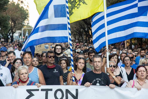 Demonstration Against The Mandatory Vaccine In Thessaloniki Demonstration Against The Mandatory Vaccine was held in Thessaloniki and Athens in Greece on Wednesday July 21, 2021. One week after the massive protest against the mandatory vaccination the anti-vaxx campaign continues with a big group protesting in the streets of the city of Thessaloniki. The protest was organized via social media by anti-vaccination believers. According to the group more than 40.000 people participated, while the police estimated unofficially slightly around 15.000 people participating in the demonstration. As the Greek government is passing a legislation with mandatory vaccination to specific job sectors like medical healthcare workers etc people are protestin  Copyright: xNicolasxEconomoux