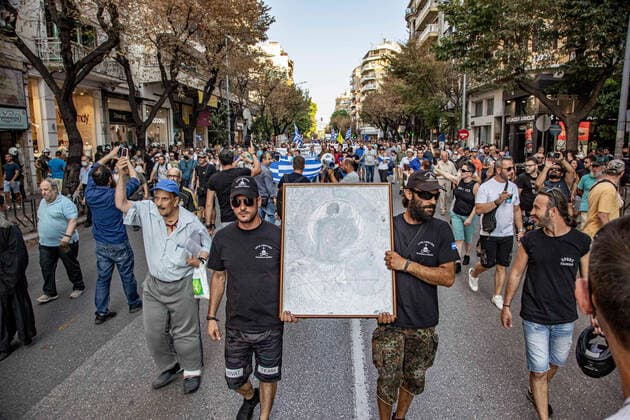 Demonstration Against The Mandatory Vaccine In Thessaloniki Demonstration Against The Mandatory Vaccine was held in Thessaloniki and Athens in Greece on Wednesday July 21, 2021. One week after the massive protest against the mandatory vaccination the anti-vaxx campaign continues with a big group protesting in the streets of the city of Thessaloniki. The protest was organized via social media by anti-vaccination believers. According to the group more than 40.000 people participated, while the police estimated unofficially slightly around 15.000 people participating in the demonstration. As the Greek government is passing a legislation with mandatory vaccination to specific job sectors like medical healthcare workers etc people are protestin  Copyright: xNicolasxEconomoux