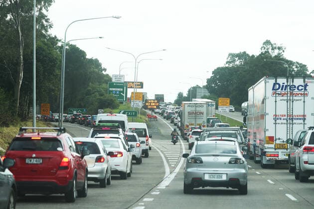 QLD BORDER COVID-19 CLOSURE, Congestion is seen on the Pacific Motorway near the Queensland and New South Wales border on the Gold Coast, Friday, July 23, 2021. ( NO ARCHIVING, EDITORIAL USE ONLY, NO USE IN BOOKS WITHOUT CONSENT GOLD COAST QLD AUSTRALIA  Copyright: xJASONxO BRIENx 20210723001559291567