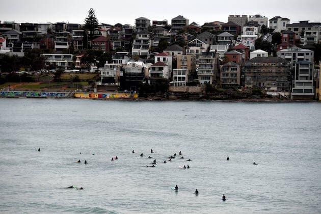 NSW CORONAVIRUS COVID19, Surfers wait for waves at Bondi Beach in Sydney, Friday, July 23, 2021. The stay-at-home orders for coronavirus-hit Greater Sydney and surrounds have been tightened with non-essential retail to close and all construction paused until July 30.( NO ARCHIVING, EDITORIAL USE ONLY, NO USE IN BOOKS WITHOUT CONSENT SYDNEY NSW AUSTRALIA  Copyright: xMICKxTSIKASx 20210723001559306911