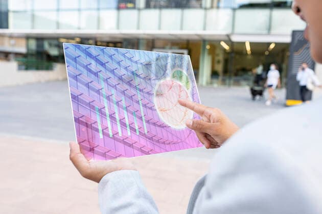 Businesswoman checking business plan on futuristic digital tablet model released Symbolfoto property released JCCMF03078